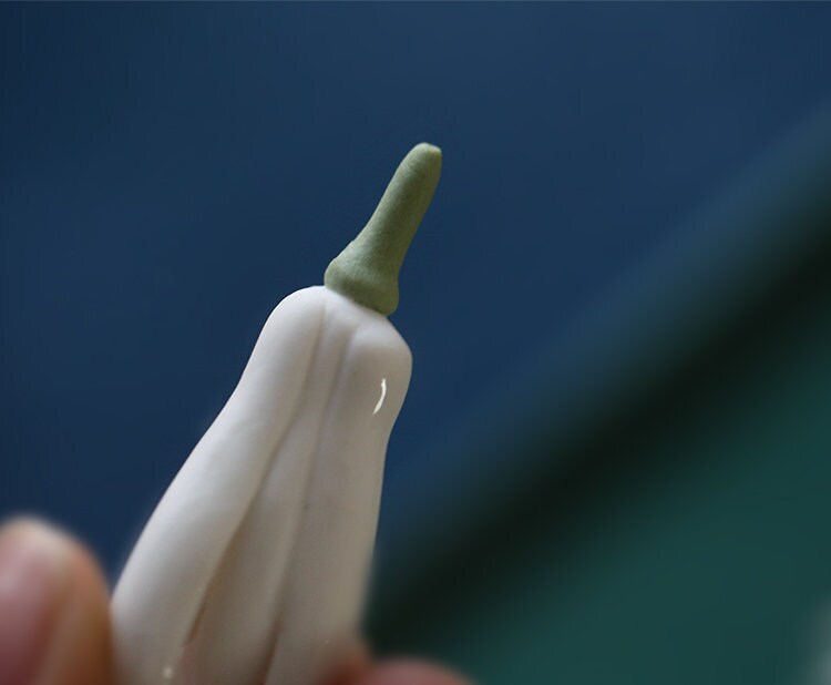 Gohobi A set of 3 handmade ceramic white flower buds tea pet ornament